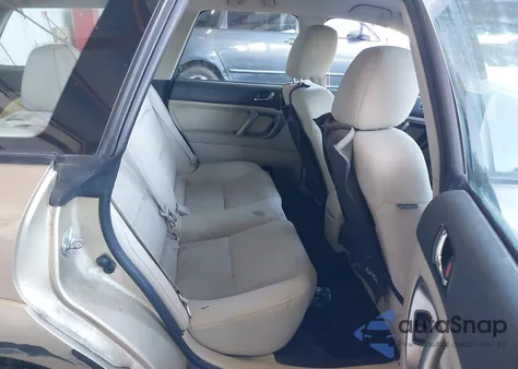 2009 Subaru Outback 2.5I z USA, uszkodzony, nr VIN 4S4BP61C997334477